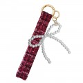 Tweed fabric Wristlet w/Pearl Bow